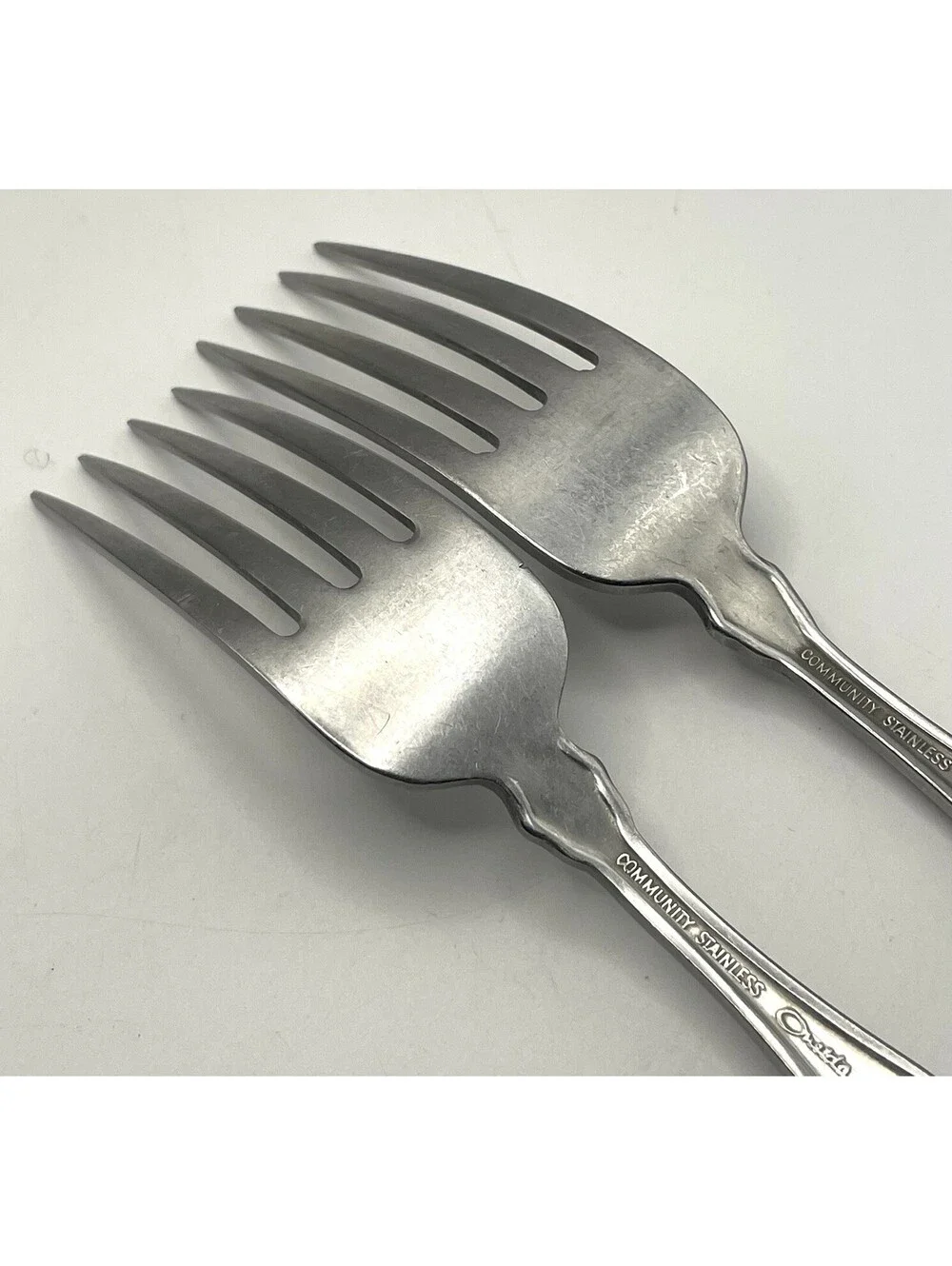 2- Oneida Community FANTASY Burnished Stainless Pierced Hndl Dinner Fork ~7.25”